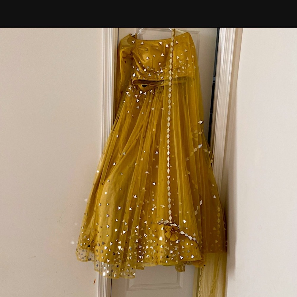 Yellow skirt( lehenga) and top